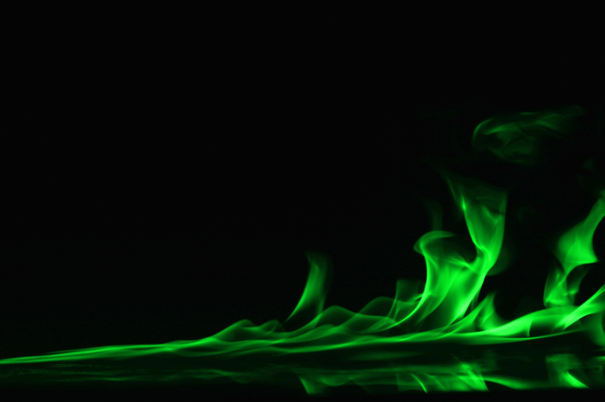 Green Flames on Black Background